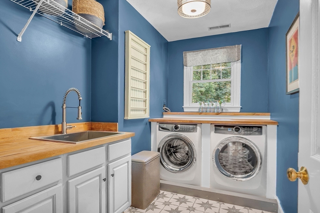 157 Lancaster Road North Andover, MA 01845 - Photo 30 of 42 a utility room with dryer and washer