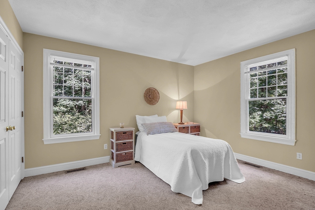 157 Lancaster Road North Andover, MA 01845 - Photo 35 of 42 a bedroom with a bed and a window