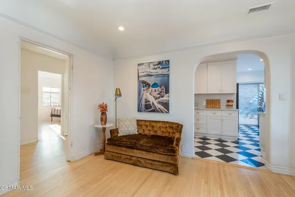 a view of cabinets with wooden floor