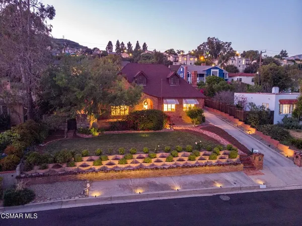 a view of a yard with an umbrella