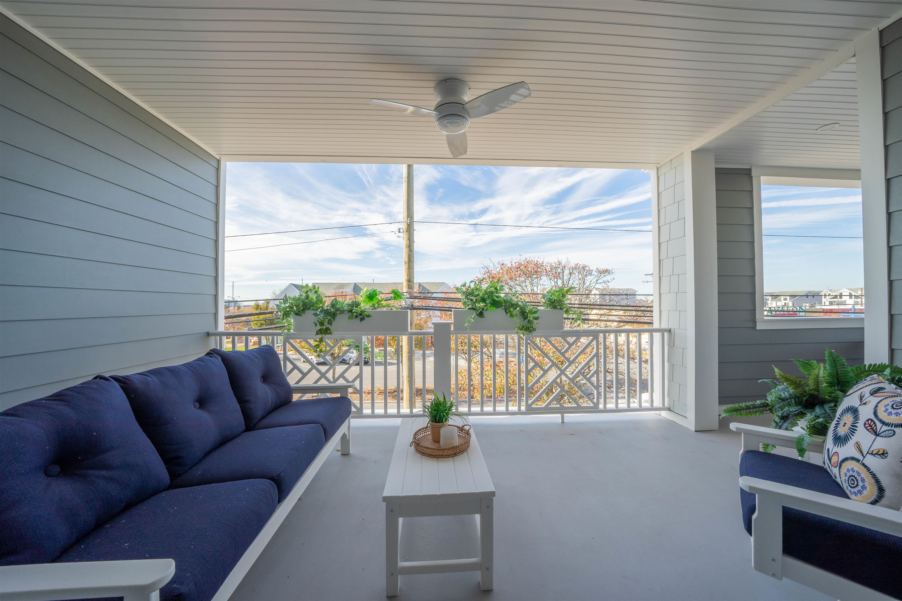 2927 Dune, Unit 1 Avalon, NJ 08202 - Photo 15 of 35 a living room with furniture and a floor to ceiling window