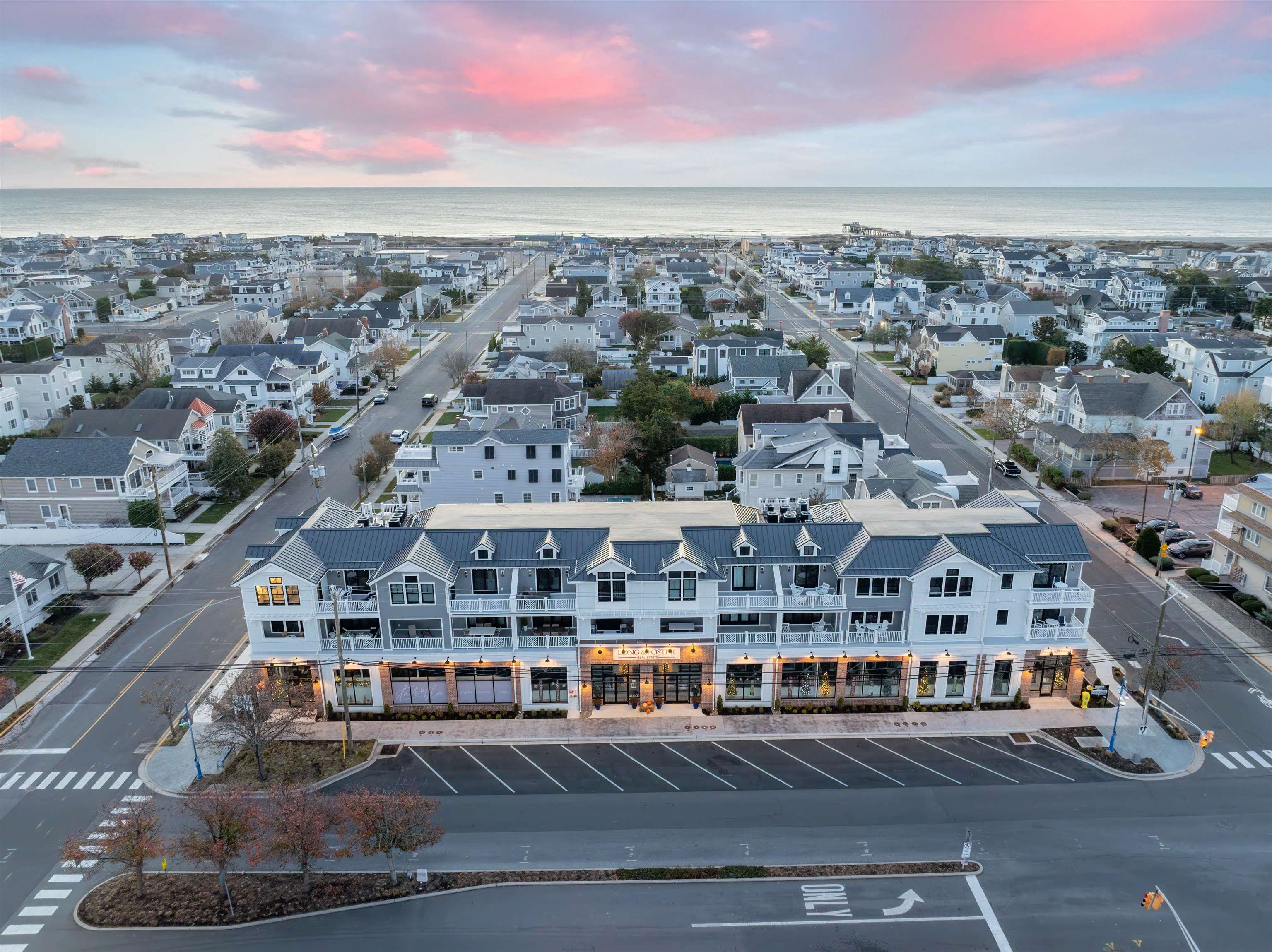 2927 Dune, Unit 1 Avalon, NJ 08202 - Photo 2 of 35 a view of a city that has tall buildings