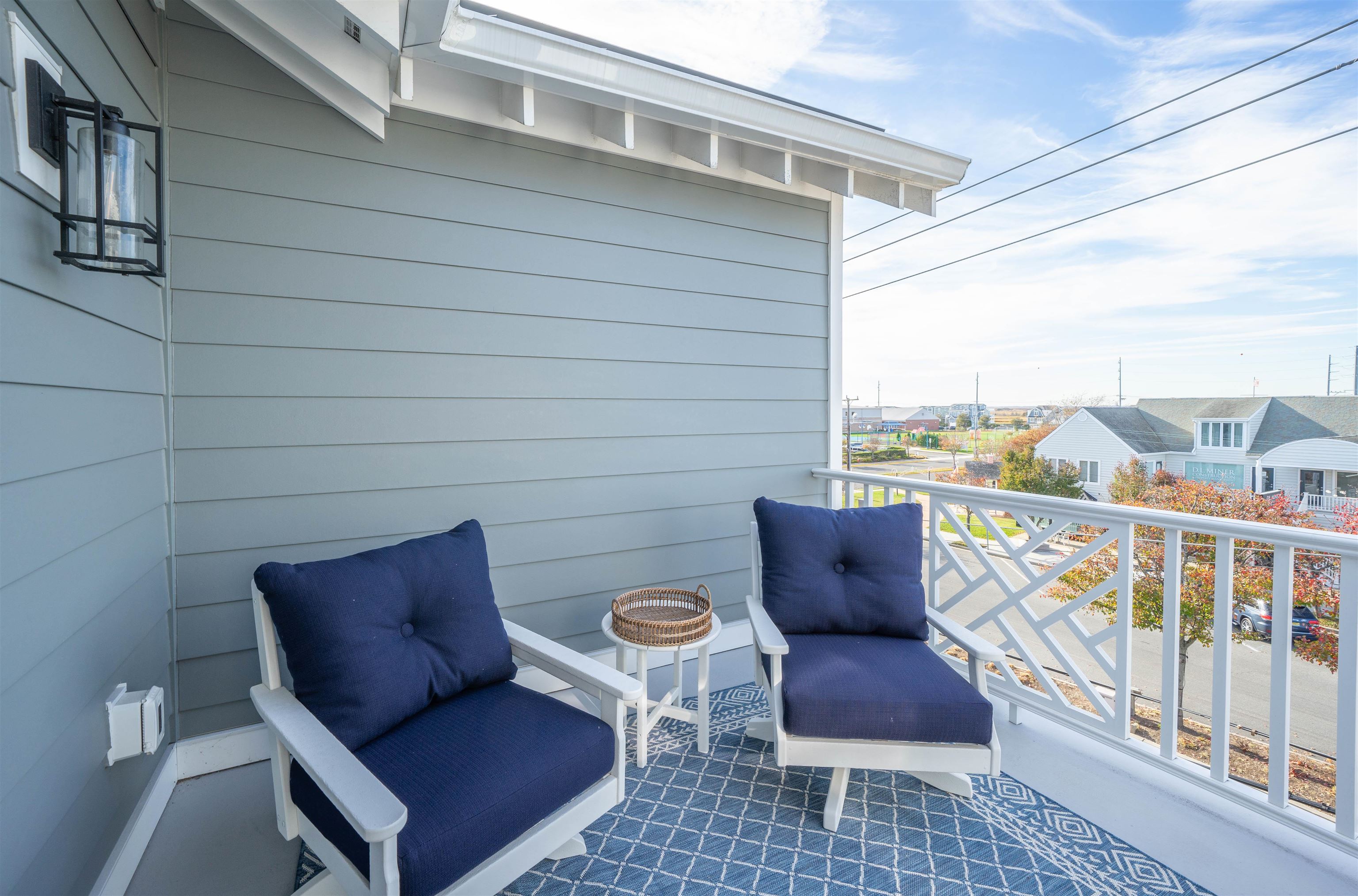2927 Dune, Unit 1 Avalon, NJ 08202 - Photo 26 of 35 a view of a chair and table in the balcony