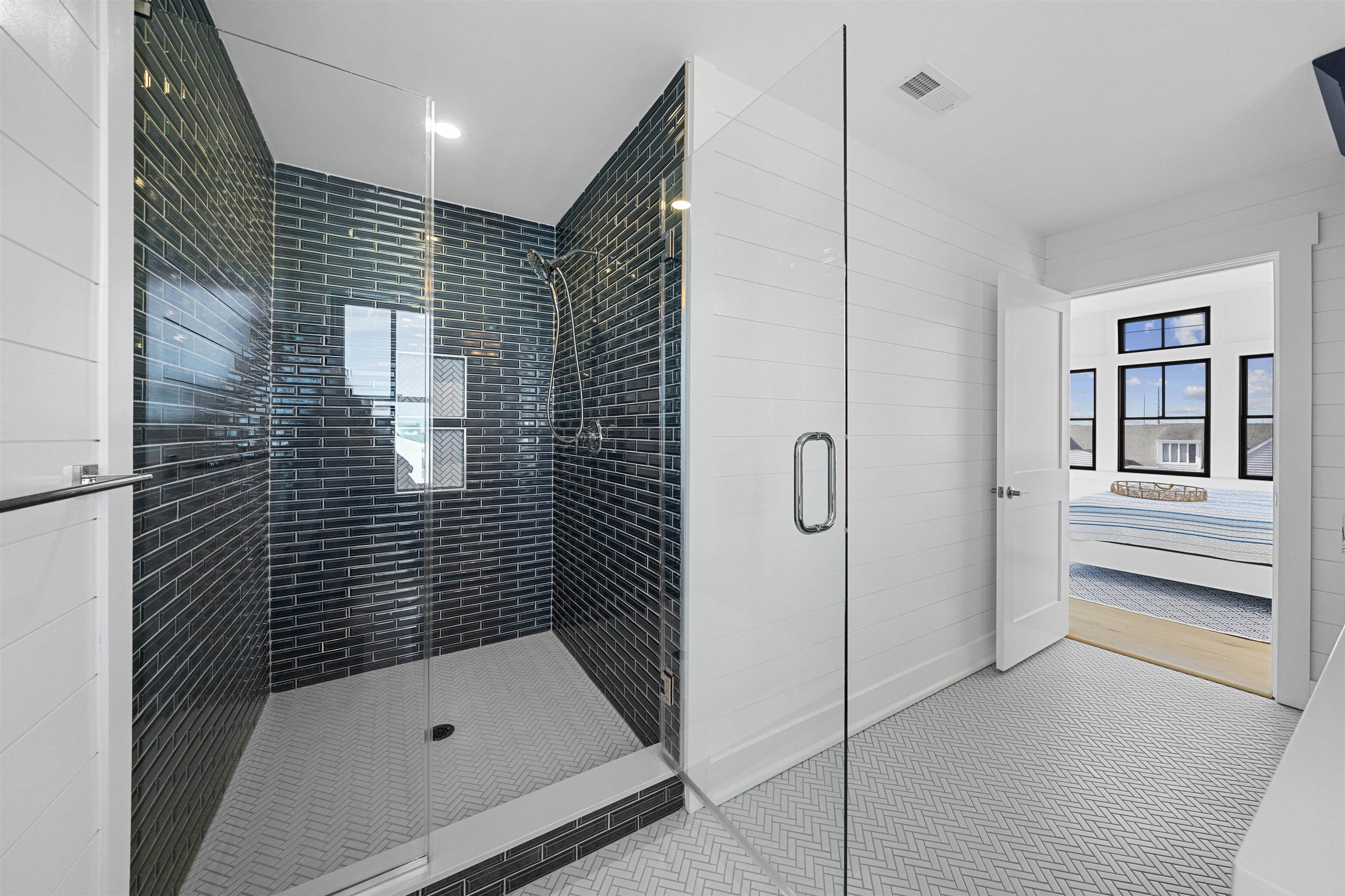 2927 Dune, Unit 1 Avalon, NJ 08202 - Photo 31 of 35 a bathroom with a bathtub and a shower