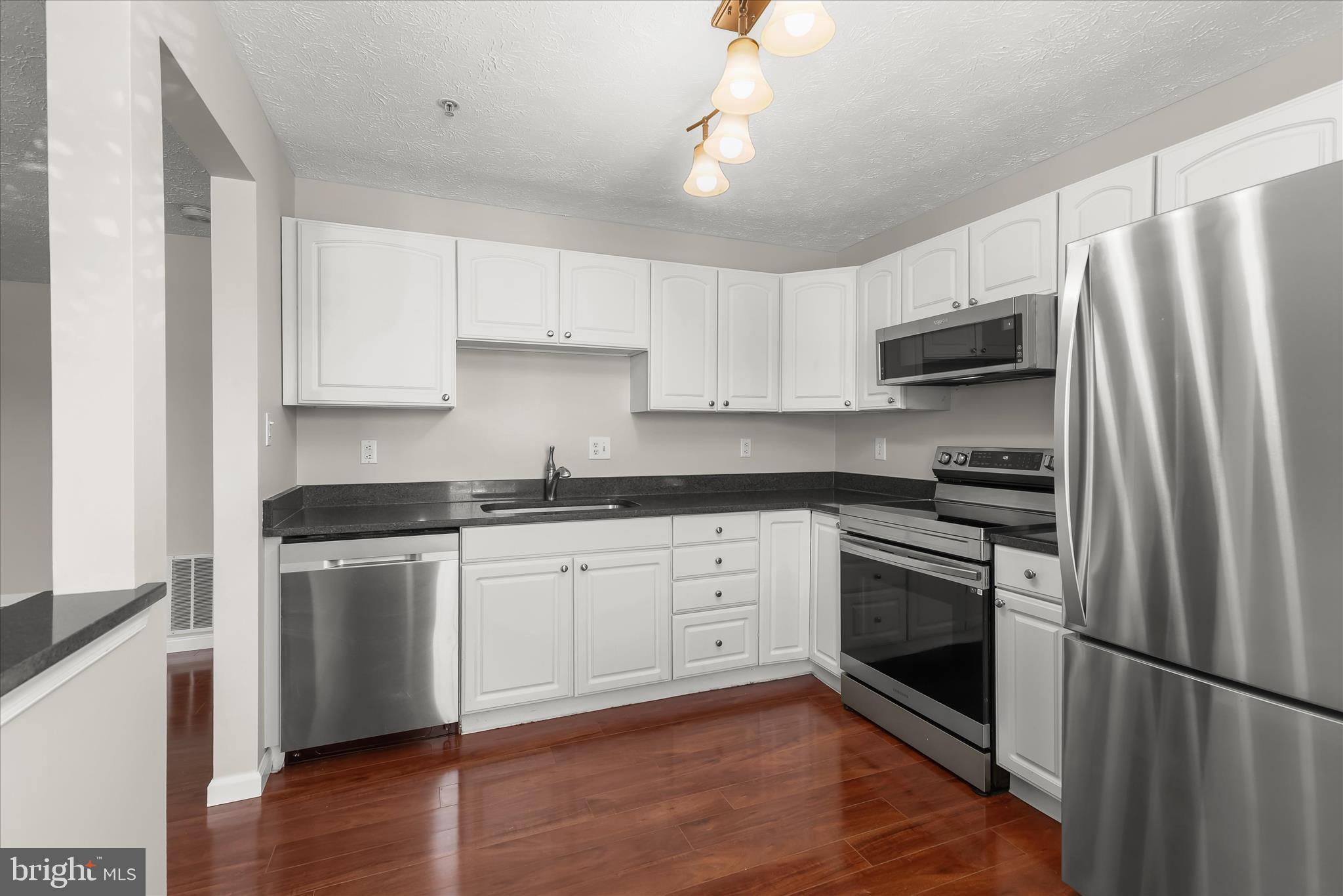 687 Winding Stream Way, Unit 204 Odenton, MD 21113 - Photo 15 of 36 Granite countertops & stainless steel appliances
