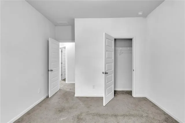an empty room with closet