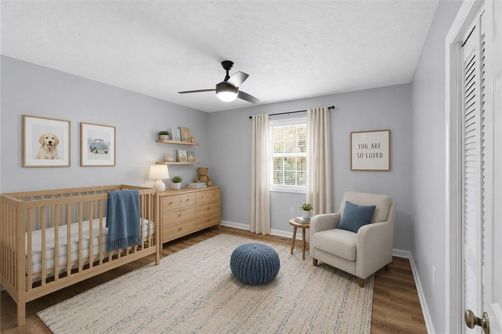 1500 Moores Ferry Road Southwest Plainville, GA 30733 - Photo 11 of 33 a living room with furniture and a wooden floor