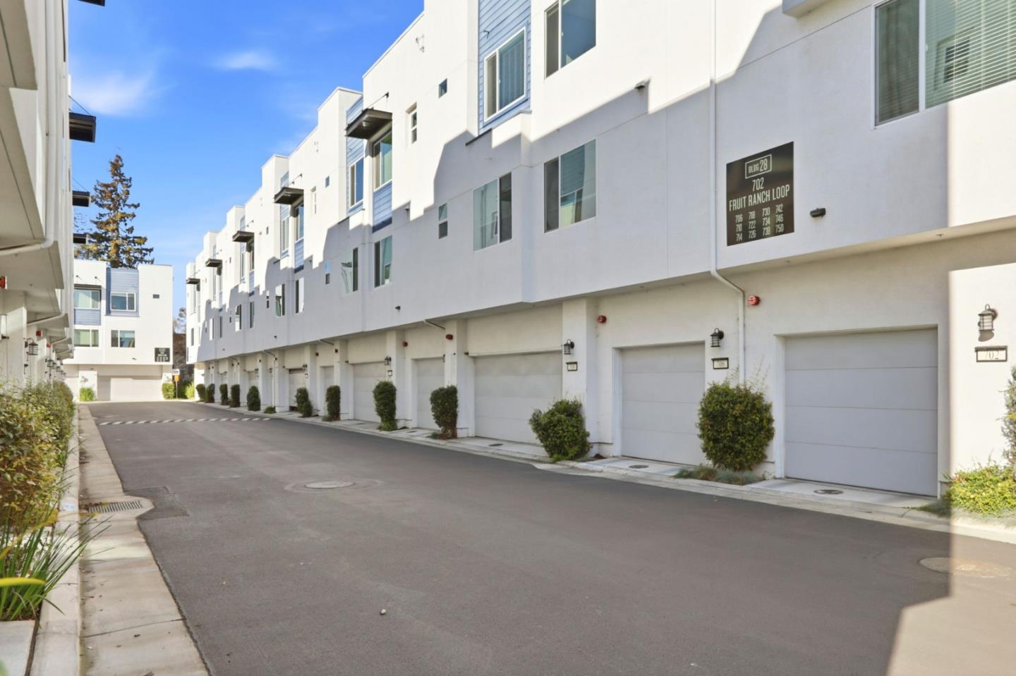 706 Fruit Ranch Loop San Jose, CA 95133 - Photo 28 of 39 a view of a street with buildings