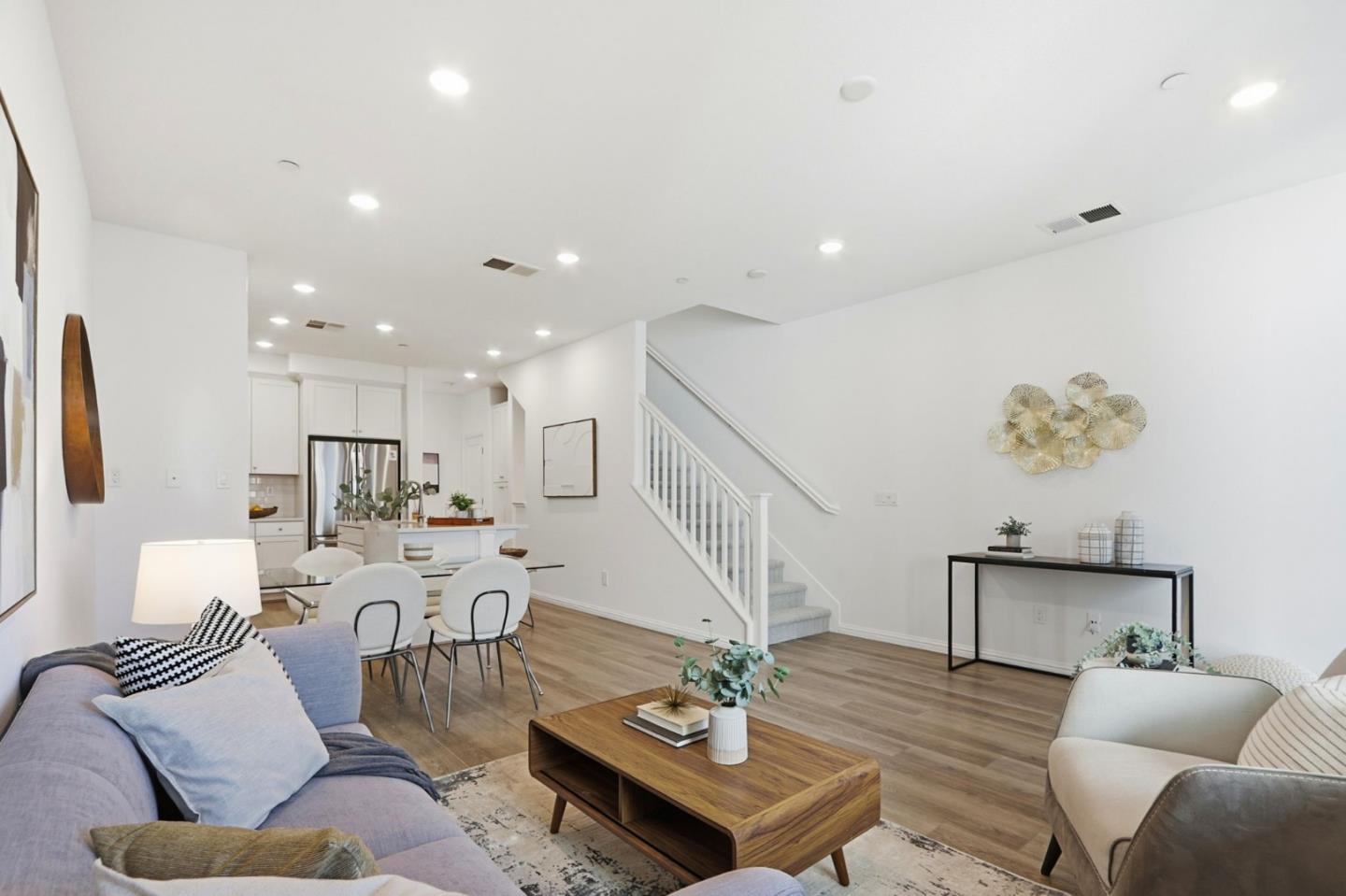706 Fruit Ranch Loop San Jose, CA 95133 - Photo 7 of 39 a living room with furniture and wooden floor