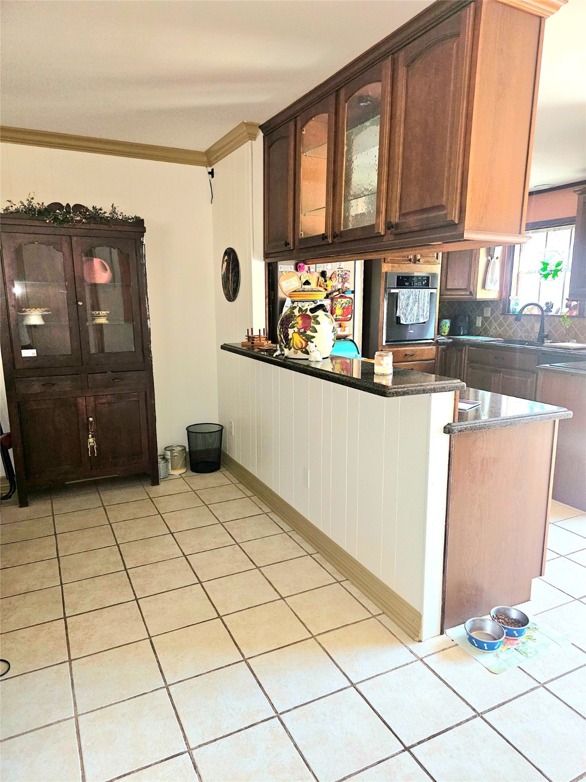 117 Laughlin Road Eagle Lake, TX 77434 - Photo 12 of 46 a kitchen with stainless steel appliances granite countertop a refrigerator and a stove