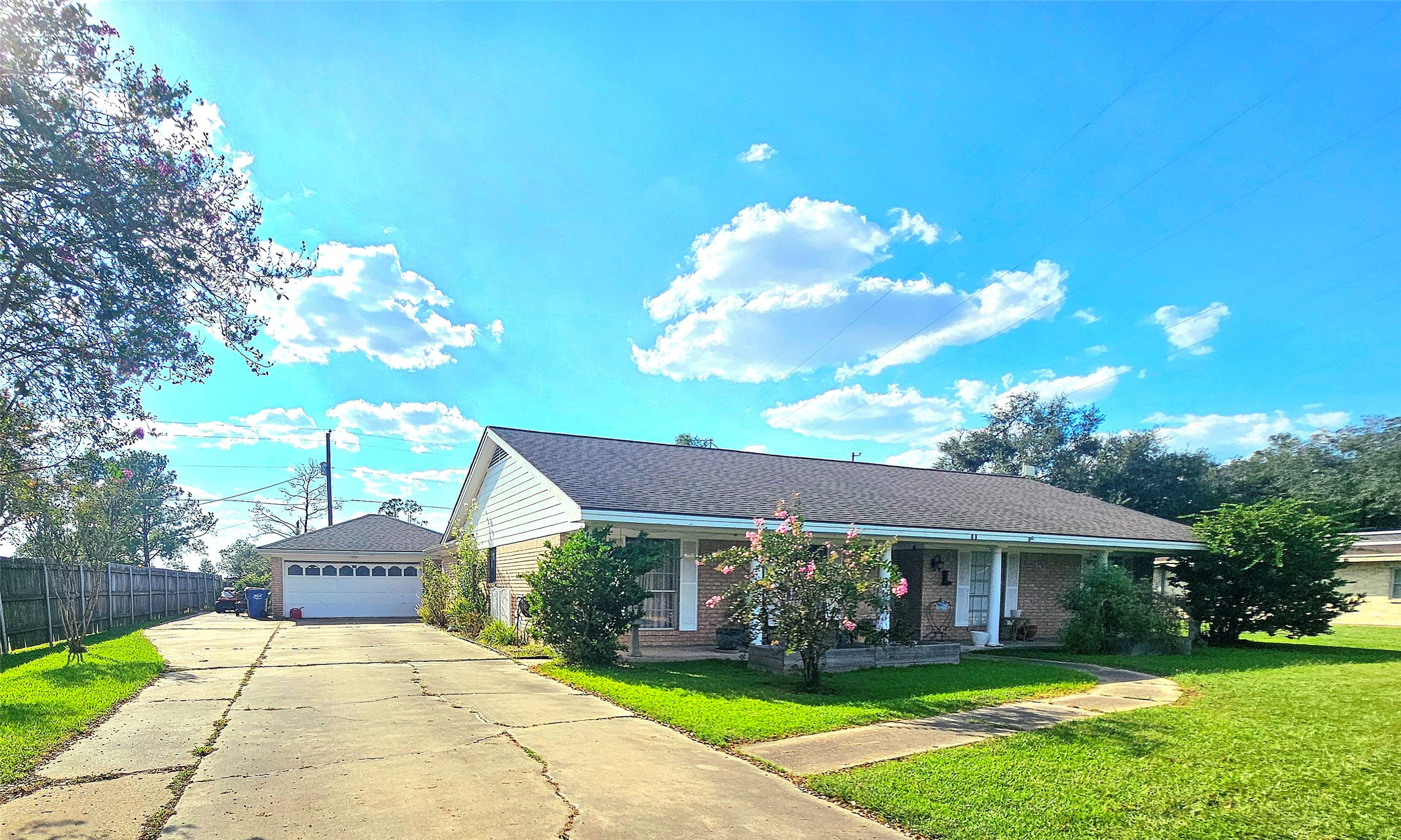 117 Laughlin Road Eagle Lake, TX 77434 - Photo 2 of 46 a front view of a house with a yard