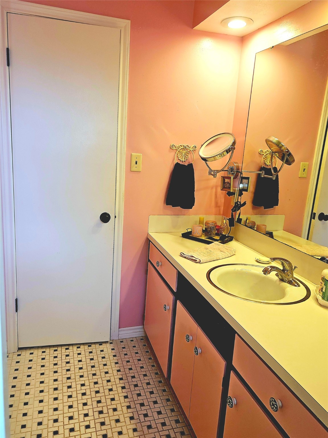 117 Laughlin Road Eagle Lake, TX 77434 - Photo 21 of 46 a bathroom with a sink and a mirror