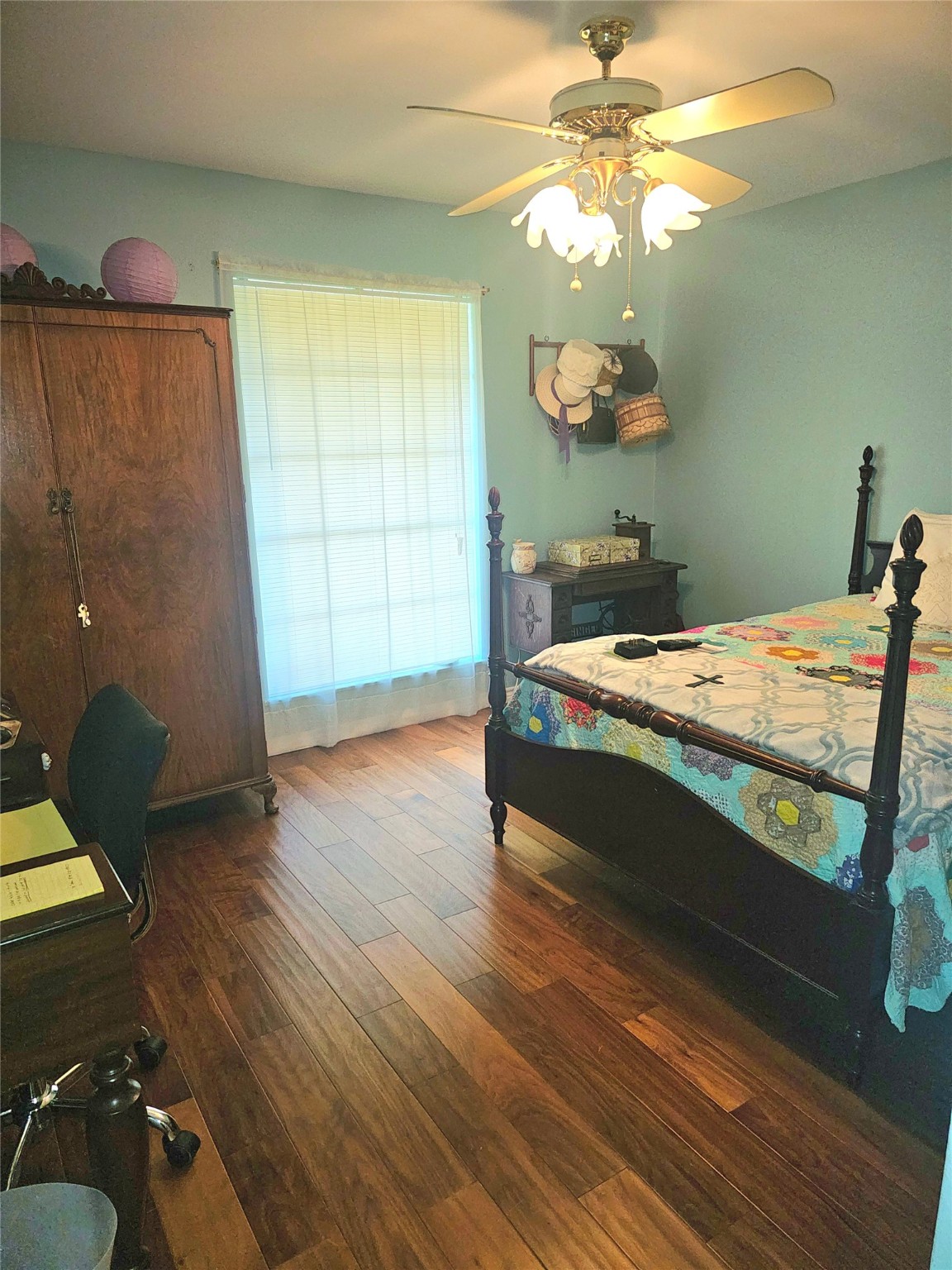 117 Laughlin Road Eagle Lake, TX 77434 - Photo 22 of 46 a bed sitting in a bedroom next to a window