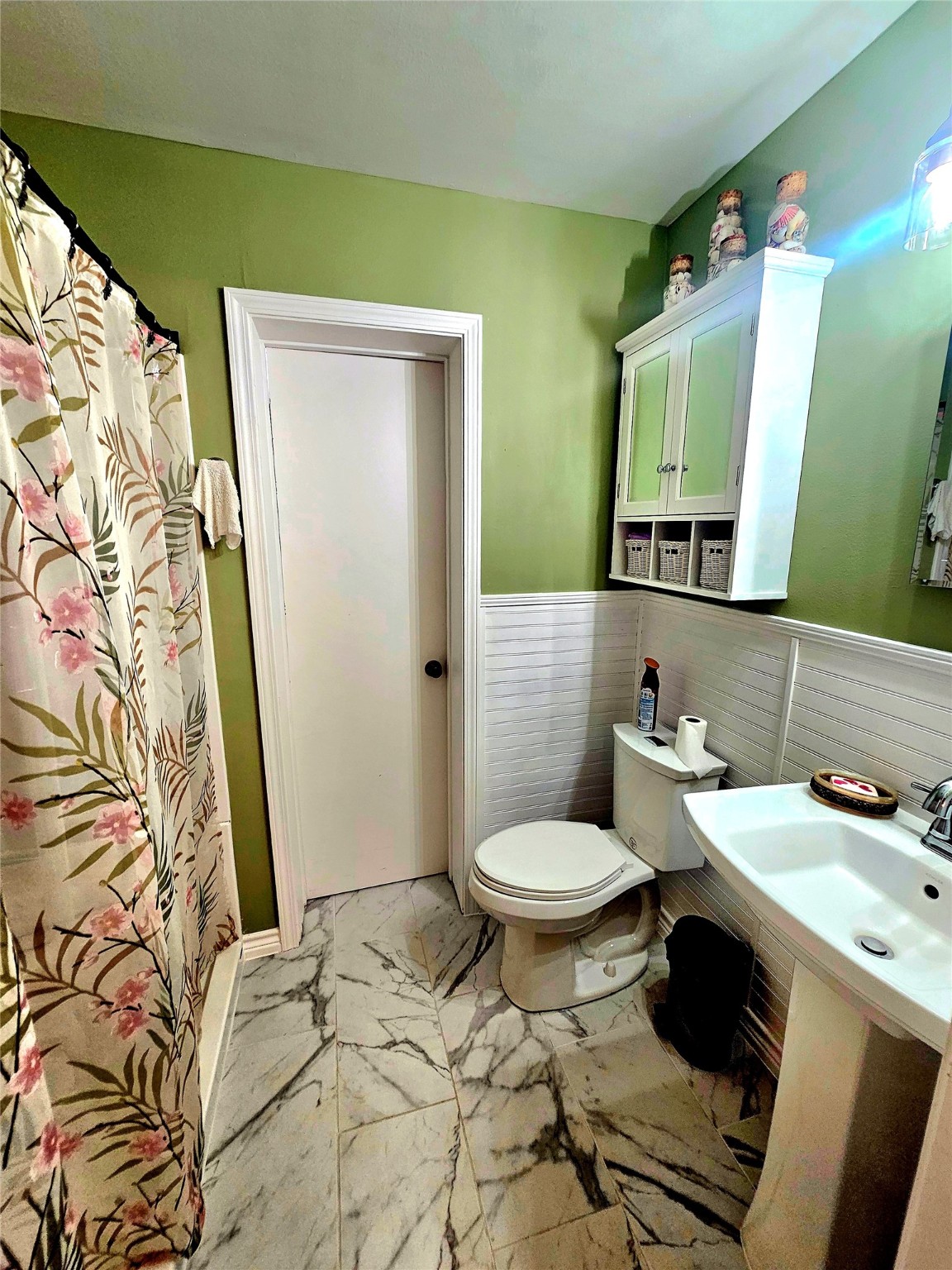 117 Laughlin Road Eagle Lake, TX 77434 - Photo 32 of 46 a bathroom with a toilet sink and mirror