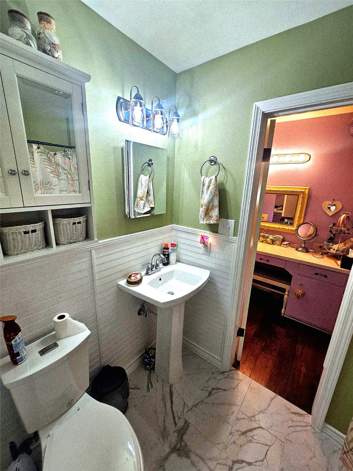 117 Laughlin Road Eagle Lake, TX 77434 - Photo 34 of 46 a bathroom with a sink mirror and toilet