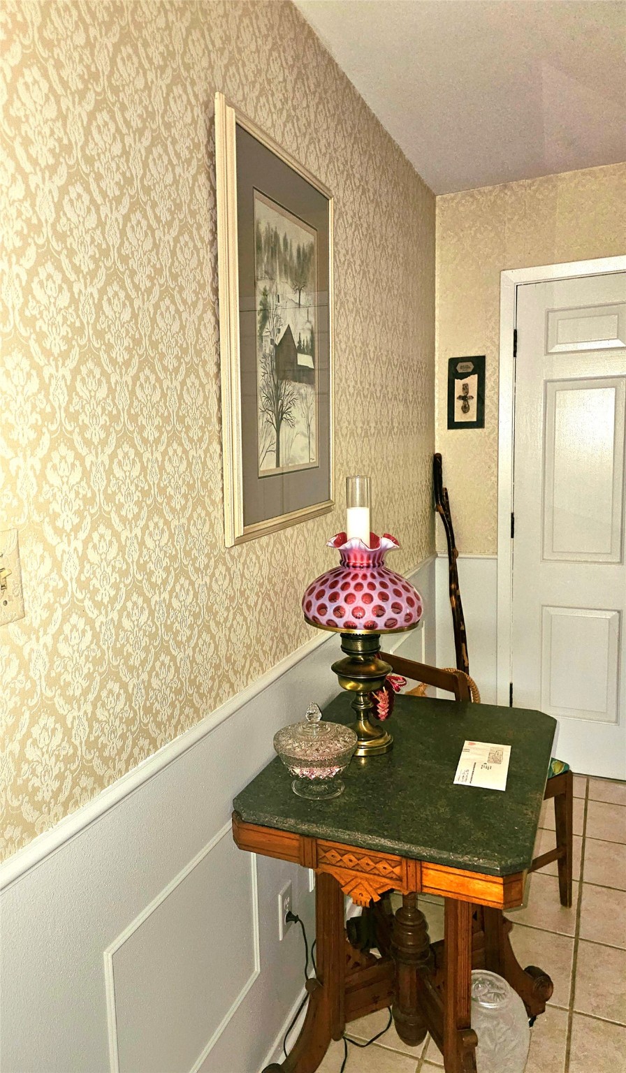 117 Laughlin Road Eagle Lake, TX 77434 - Photo 5 of 46 a view of a workspace with a table and couch