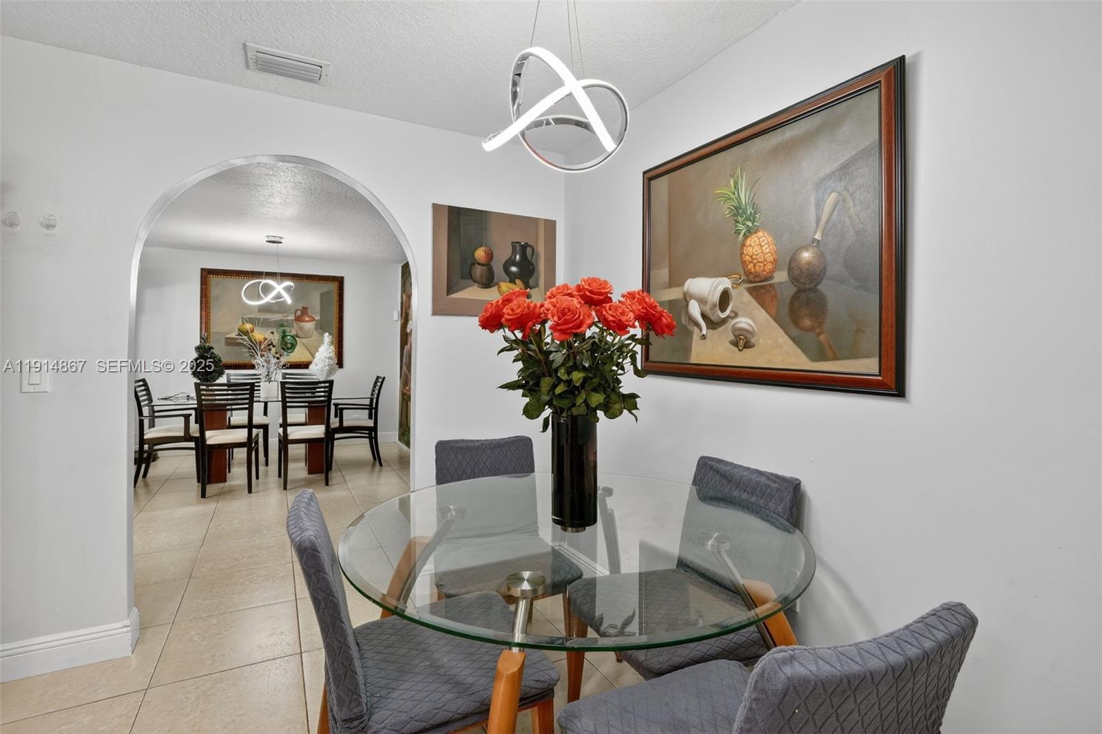 9835 Southwest 26th Terrace Miami, FL 33165 - Photo 11 of 48 a dining room with furniture and window