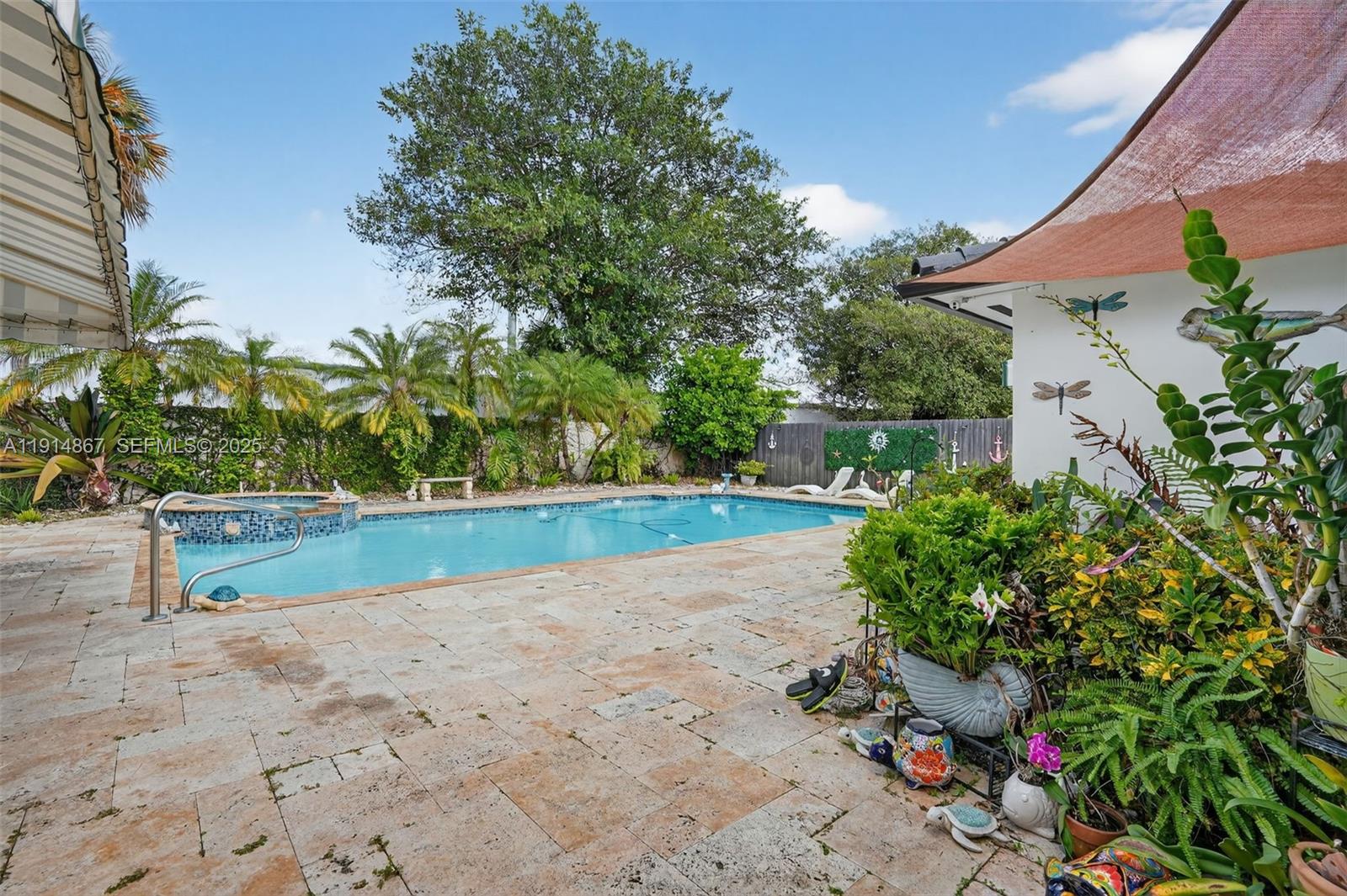 9835 Southwest 26th Terrace Miami, FL 33165 - Photo 32 of 48 a view of backyard with large trees