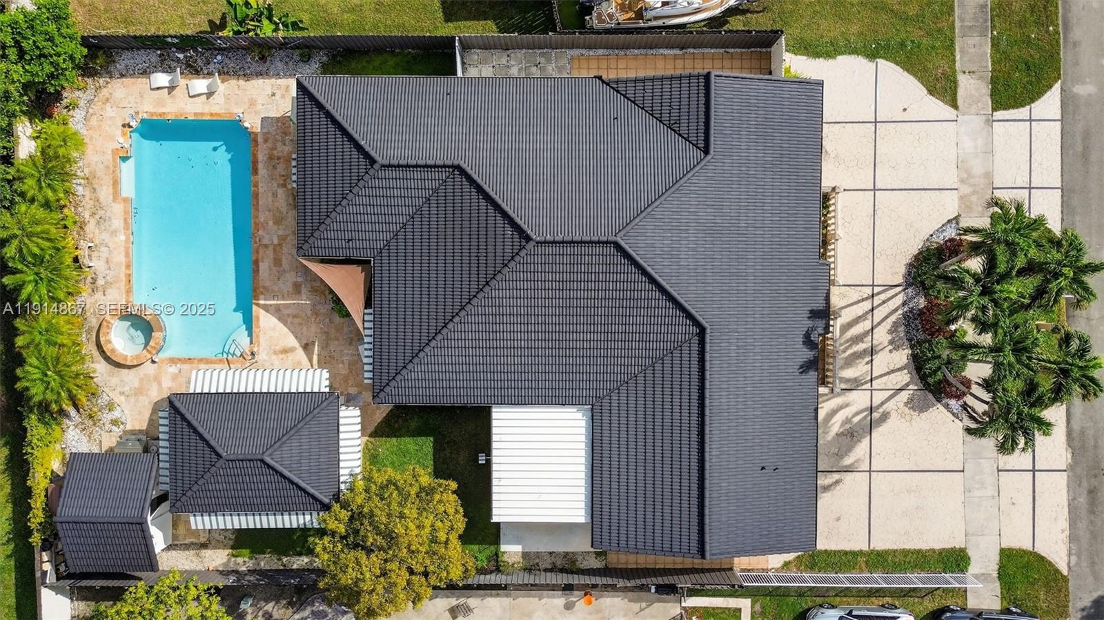 9835 Southwest 26th Terrace Miami, FL 33165 - Photo 48 of 48 a aerial view of a house with a yard and potted plants