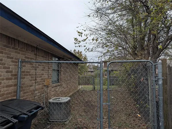 a bathroom with a toilet and shower