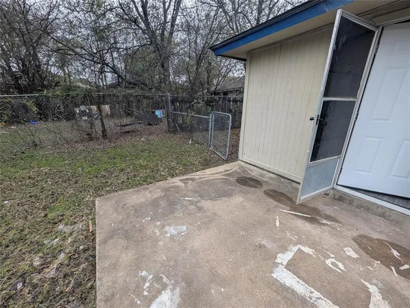 a backyard of a house with lots of green space