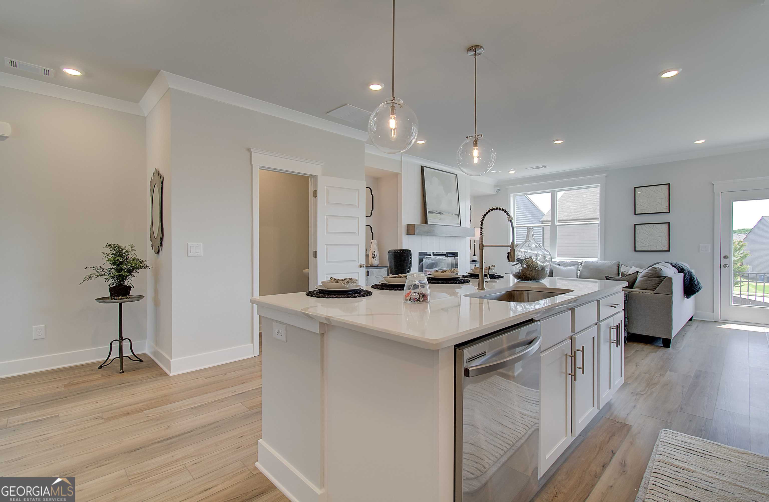 179 Depot Landing Road, Unit 27A Auburn, GA 30011 - Photo 2 of 38 a kitchen with counter space sink stove and refrigerator