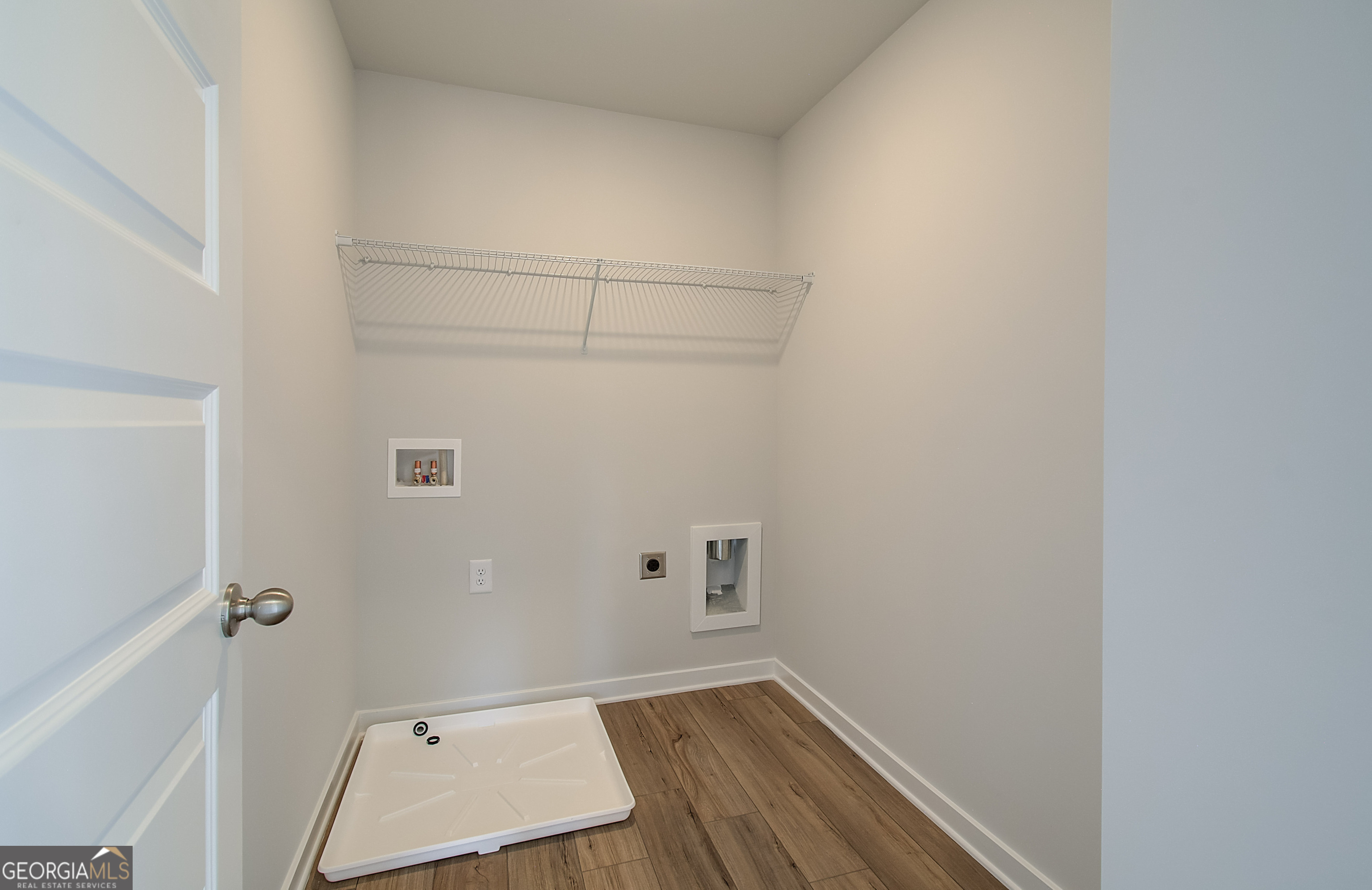 179 Depot Landing Road, Unit 27A Auburn, GA 30011 - Photo 26 of 38 wooden floor in an empty room