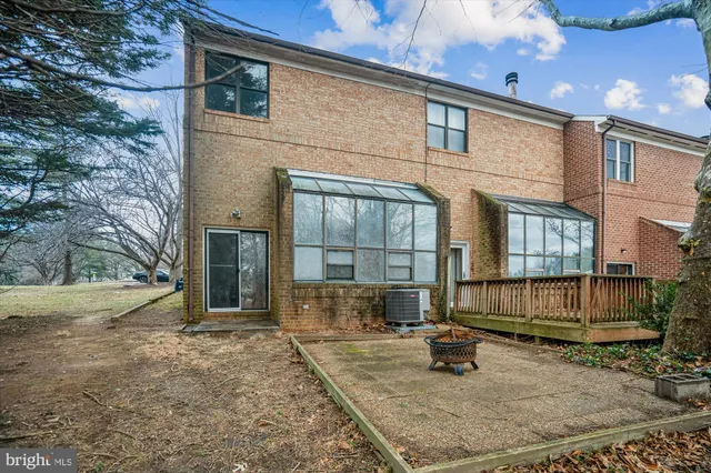 a view of front door with hallway and stairs