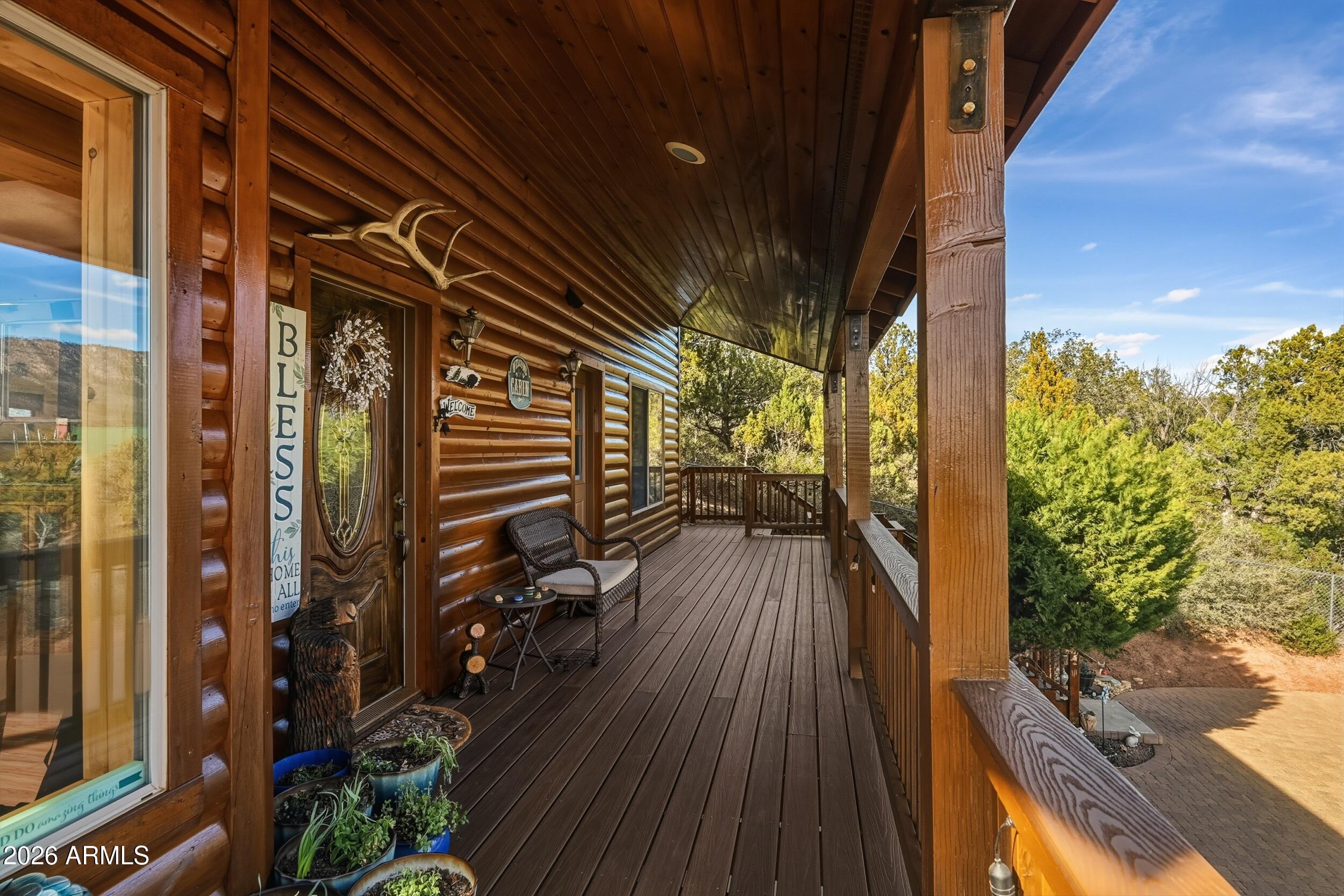 3119 Kysar Way Pine, AZ 85544 - Photo 32 of 68 a view of a balcony with wooden floor