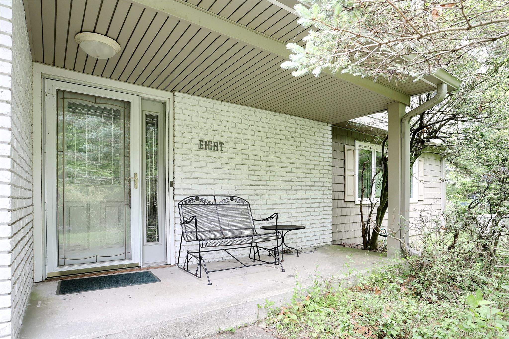 8 Swallow Avenue Spring Valley, NY 10977 - Photo 2 of 28 a backyard of a house with seating space