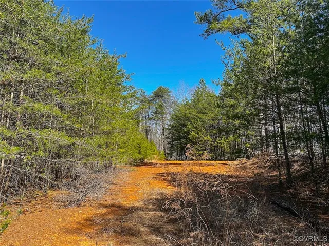 a view of swimming pool with an outdoor space and seating area