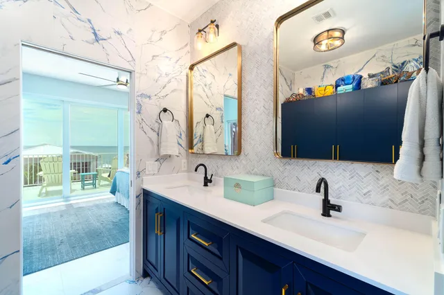 a bathroom with a sink a toilet and bathtub