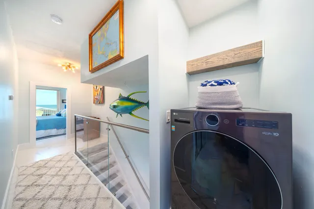 a view of swimming pool with outdoor seating and deck