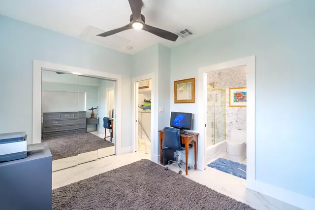 a outdoor living space with furniture and a potted plant