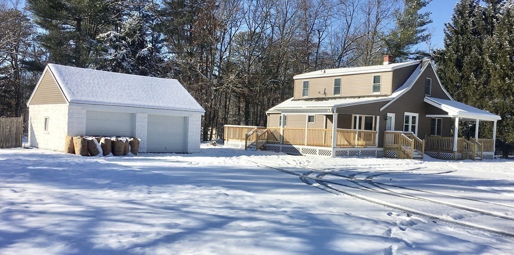 945 Tinkham Road Wilbraham, MA 01095 - Photo 23 of 26 a front view of a house with a yard