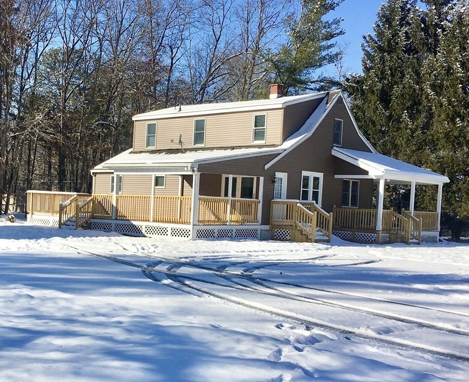945 Tinkham Road Wilbraham, MA 01095 - Photo 25 of 26 a front view of a house with a yard