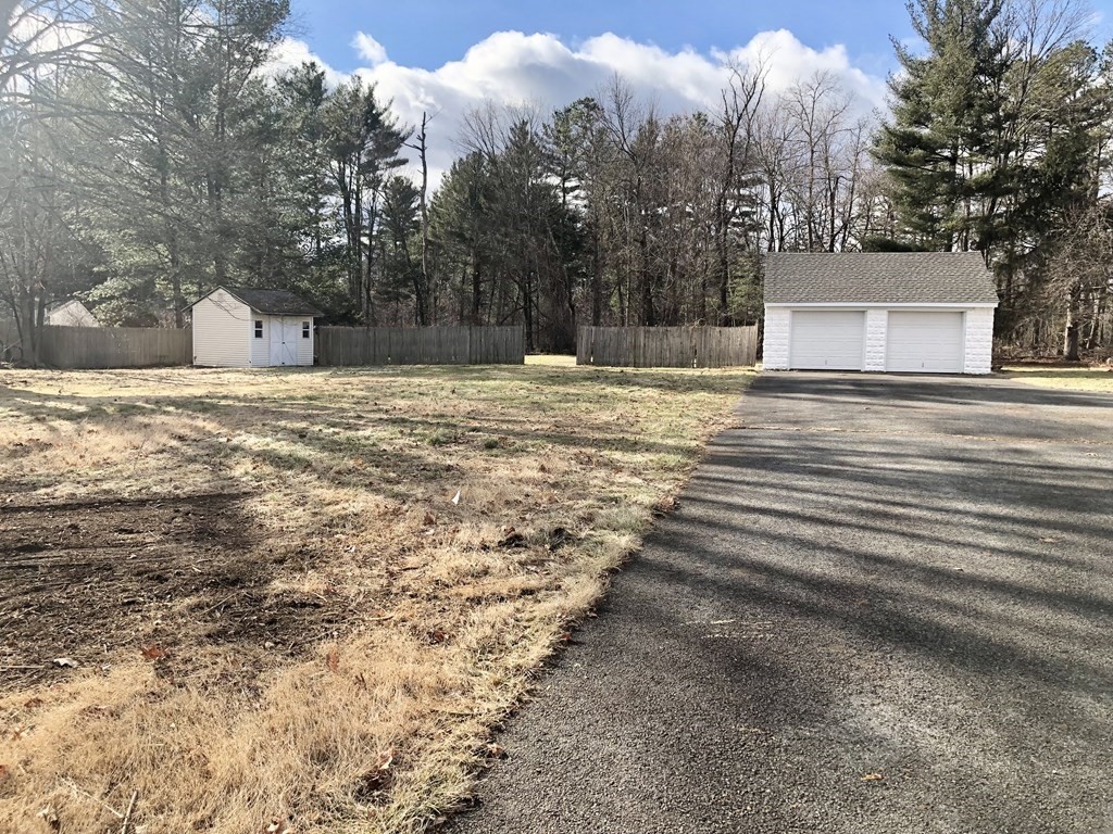 945 Tinkham Road Wilbraham, MA 01095 - Photo 26 of 26 a view of a yard with a house