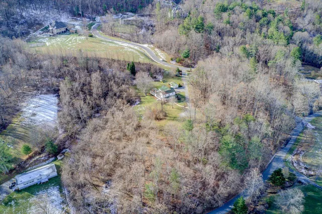a view of a backyard of a house