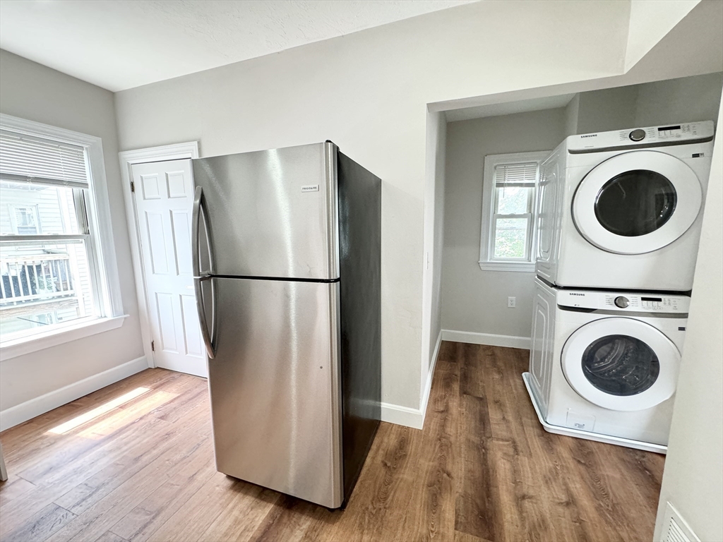 6 Cawfield Street, Unit 2 Boston, MA 02125 - Photo 2 of 8 a view of a refrigerator in kitchen and a sink