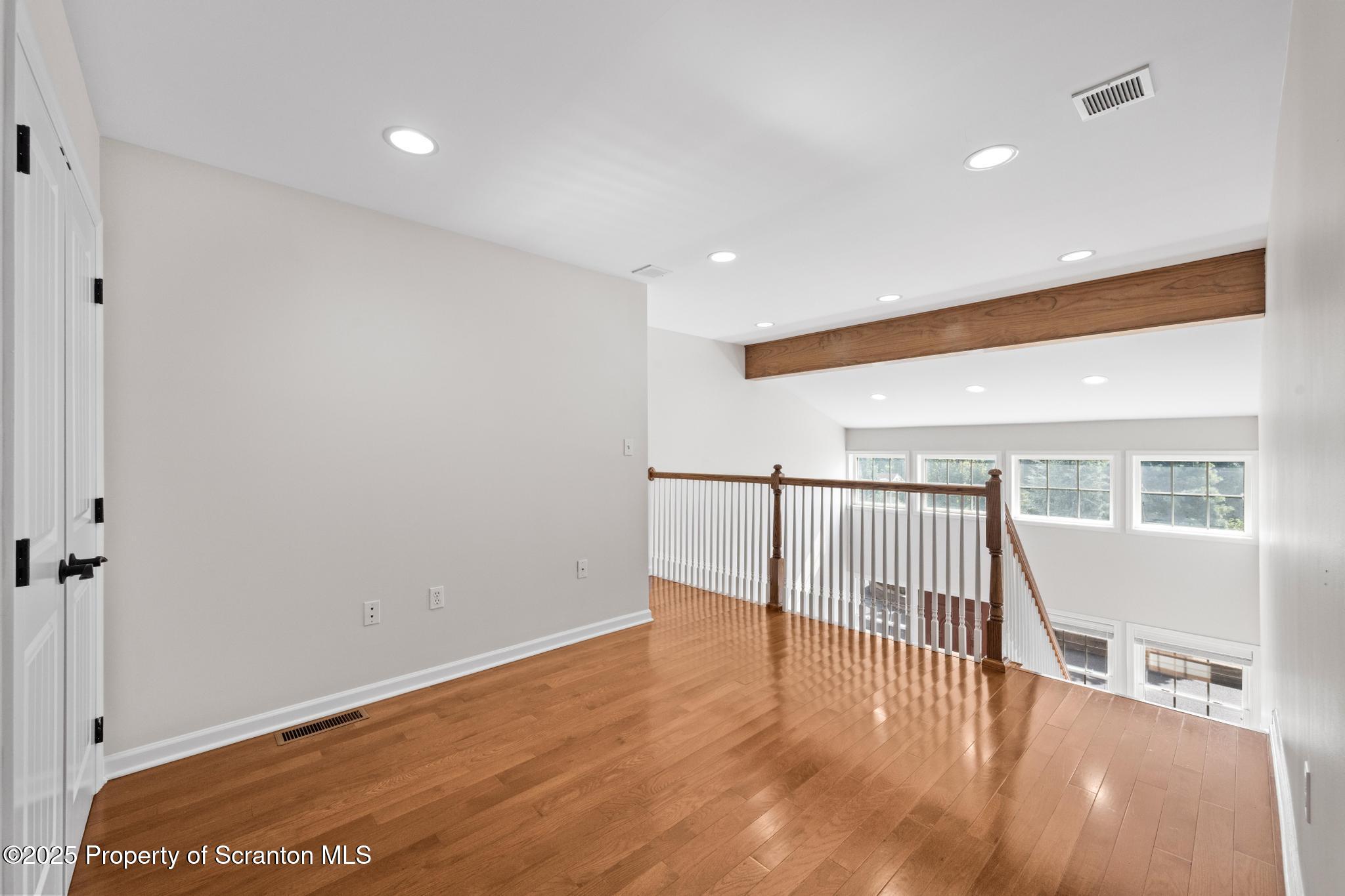 609 Edith Street Old Forge, PA 18518 - Photo 14 of 25 a view of entryway with wooden floor