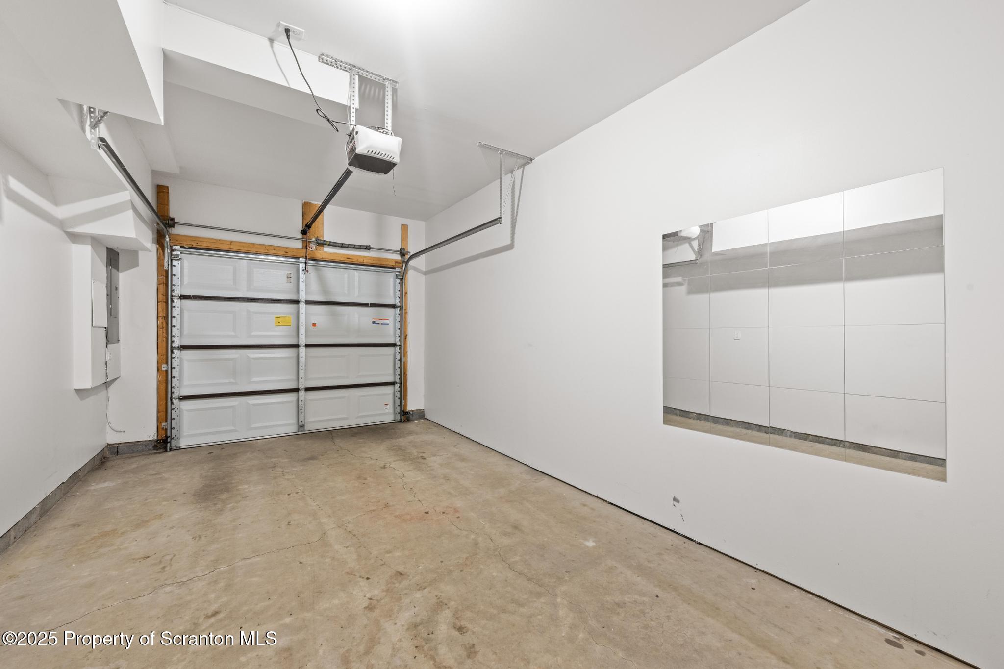 609 Edith Street Old Forge, PA 18518 - Photo 22 of 25 a view of room with stairs and a window