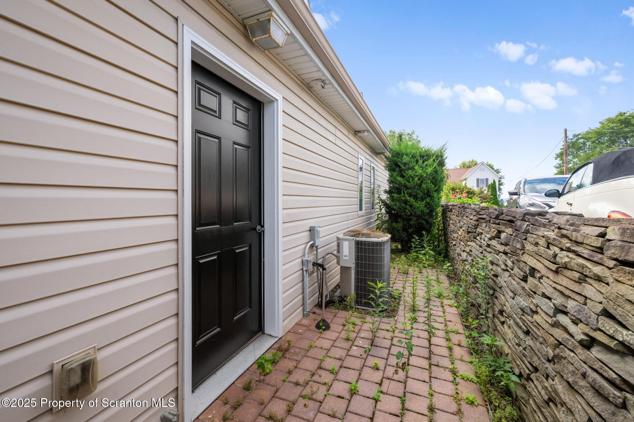 609 Edith Street Old Forge, PA 18518 - Photo 24 of 25 a view of a pathway of a house