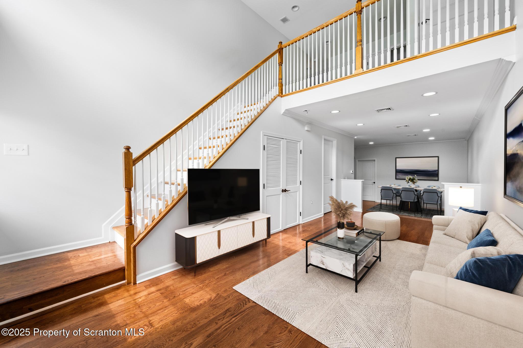 609 Edith Street Old Forge, PA 18518 - Photo 3 of 25 a living room with furniture and a flat screen tv