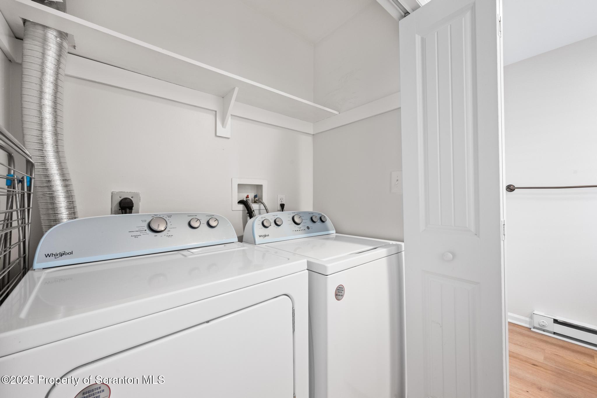 609 Edith Street Old Forge, PA 18518 - Photo 10 of 25 a utility room with dryer and washer