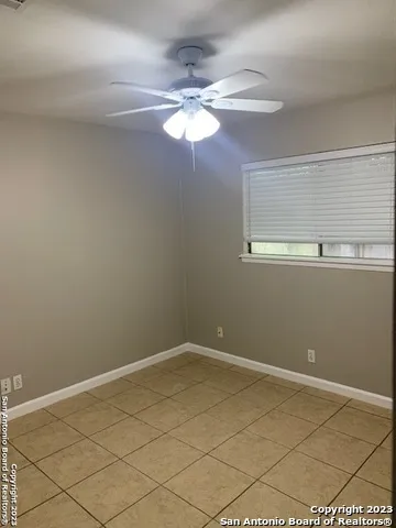 a view of a small space with wooden floor