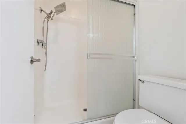 a bathroom with a double vanity sink and mirror