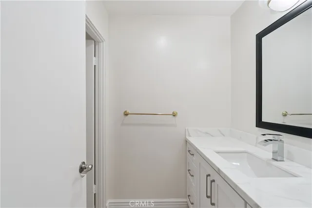 a bathroom with a shower and a toilet
