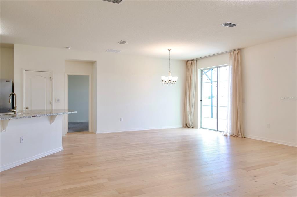 2164 Carriage Pointe Loop Apopka, FL 32712 - Photo 15 of 30 a view of a kitchen and a window