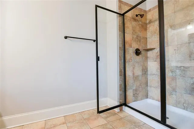 an aerial view of a house with outdoor space