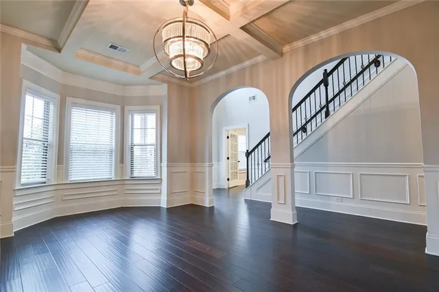 a view of livingroom with hardwood floor and hallway